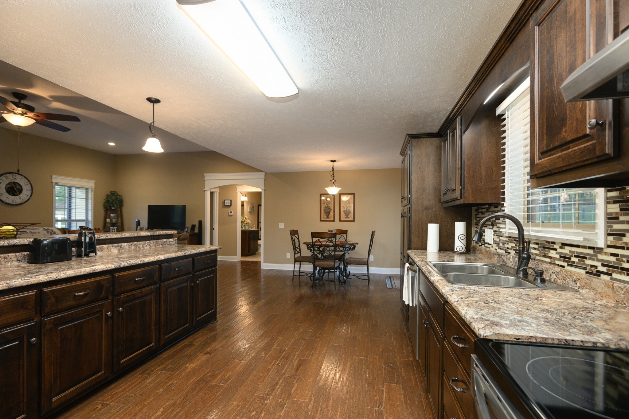 255 Troupe Road Shelbyville, TN 37160 - Photo 13 of 68 a kitchen with lots of counter top space and dining table