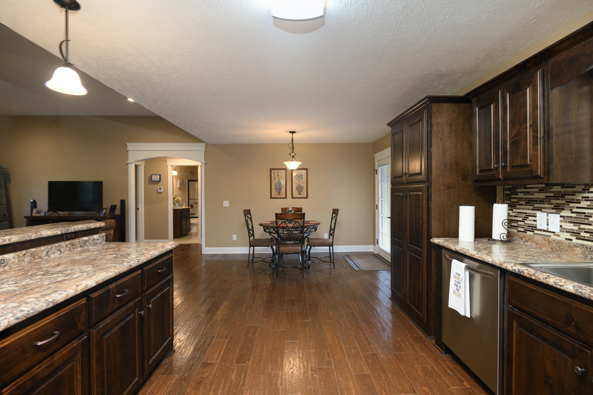 255 Troupe Road Shelbyville, TN 37160 - Photo 15 of 68 a kitchen with granite countertop a stove a sink and a refrigerator