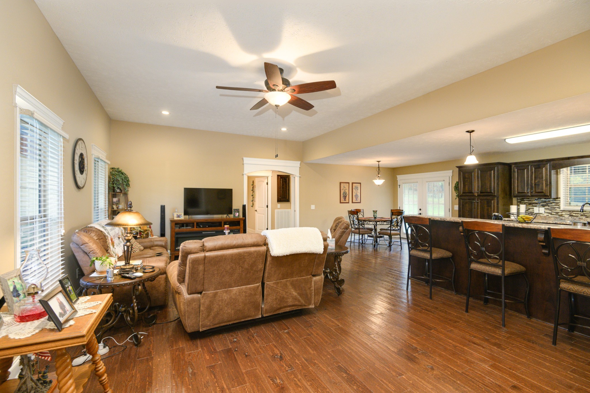 255 Troupe Road Shelbyville, TN 37160 - Photo 19 of 68 a living room with furniture kitchen view and a wooden floor