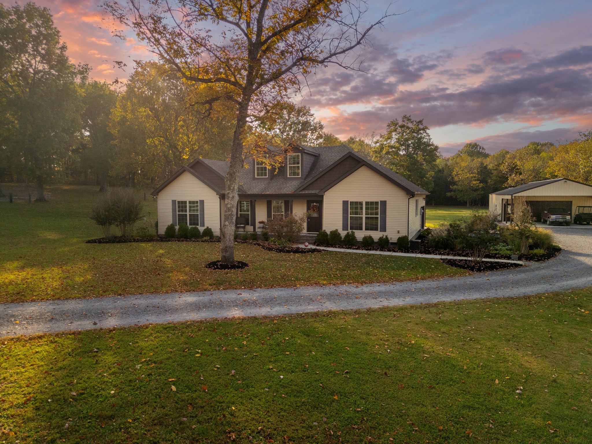 255 Troupe Road Shelbyville, TN 37160 - Photo 2 of 68 a view of house with garden and tall trees