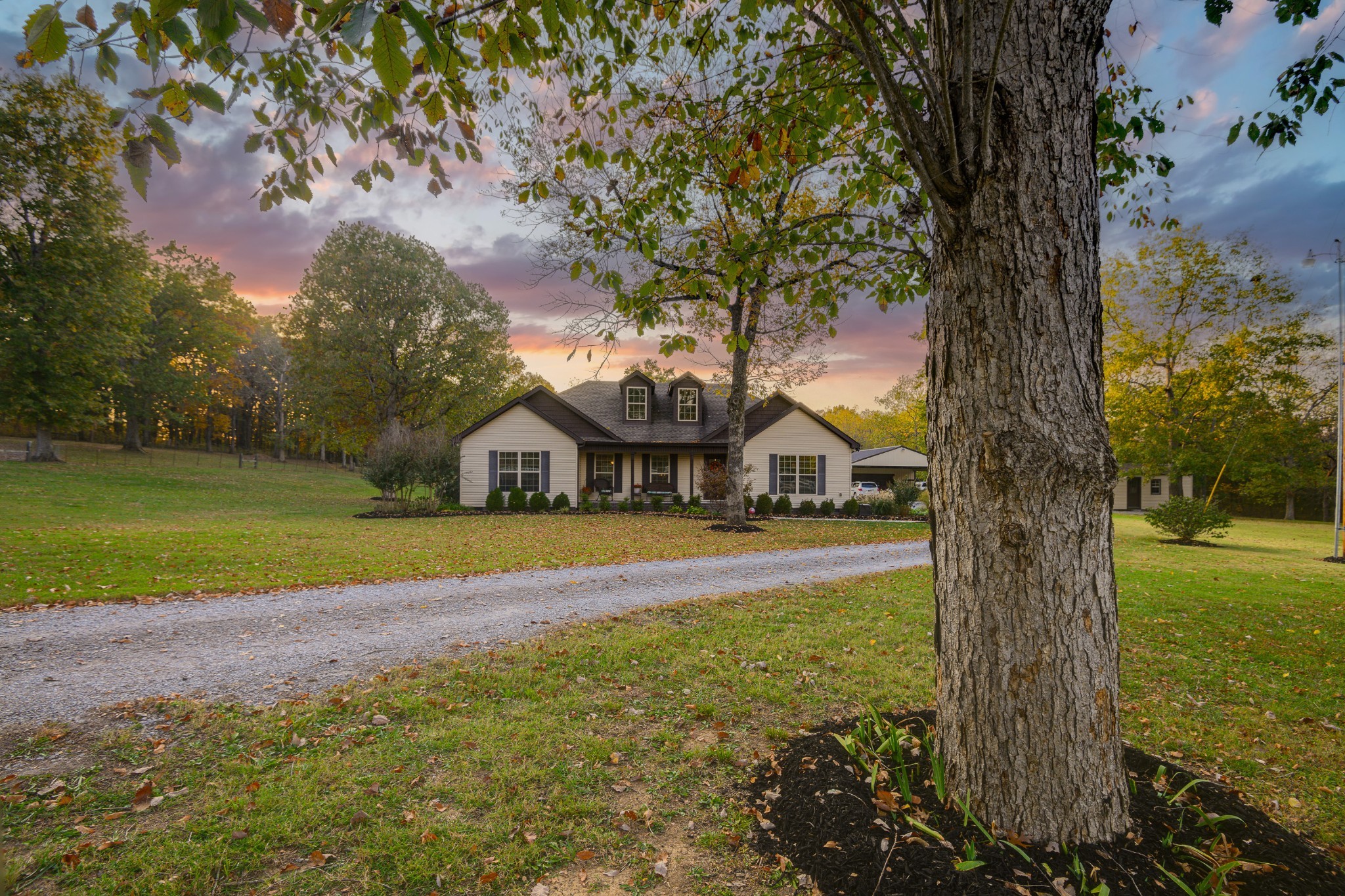 255 Troupe Road Shelbyville, TN 37160 - Photo 3 of 68 a front view of a house with a yard