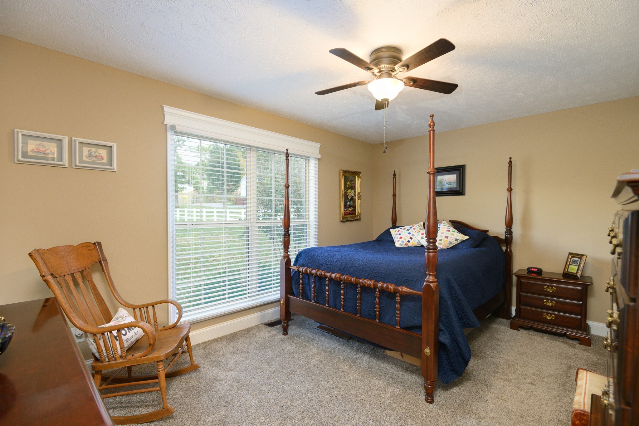 255 Troupe Road Shelbyville, TN 37160 - Photo 35 of 68 a bed room with a bed and a chair