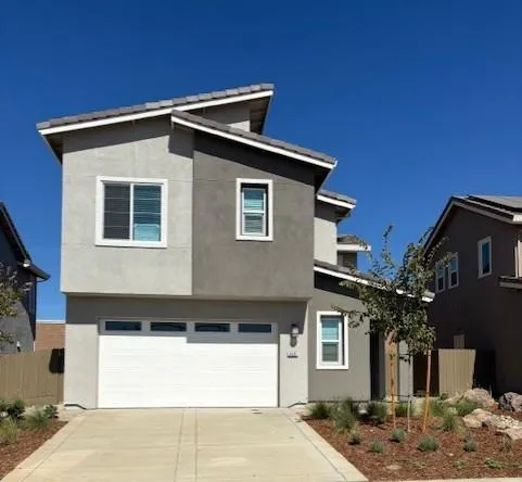 a front view of a house with a space