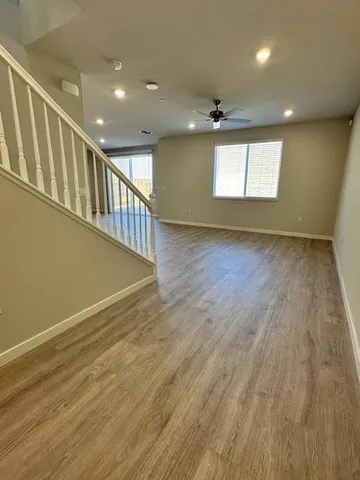 an entryway in an empty room with a window