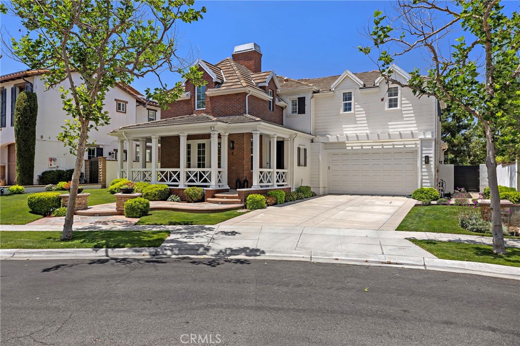 3 Tranquility Place Ladera Ranch, CA 92694 - Photo 47 of 63 a front view of a house with sitting area and garden