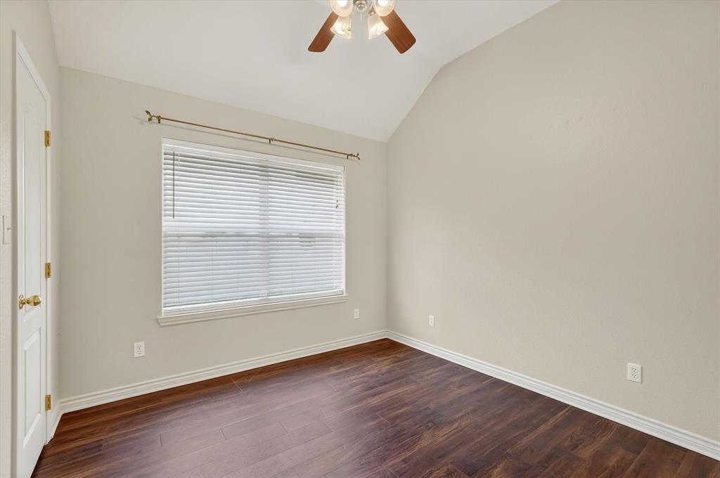 2828 Bennett Road Howe, TX 75459 - Photo 26 of 39 an empty room with a window and a ceiling fan