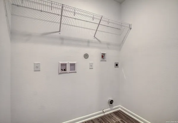 a view of a room with racks on the wall