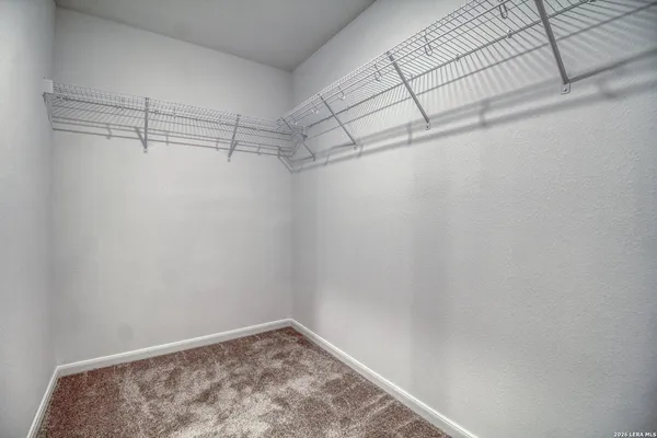 a view of a room with racks on the wall