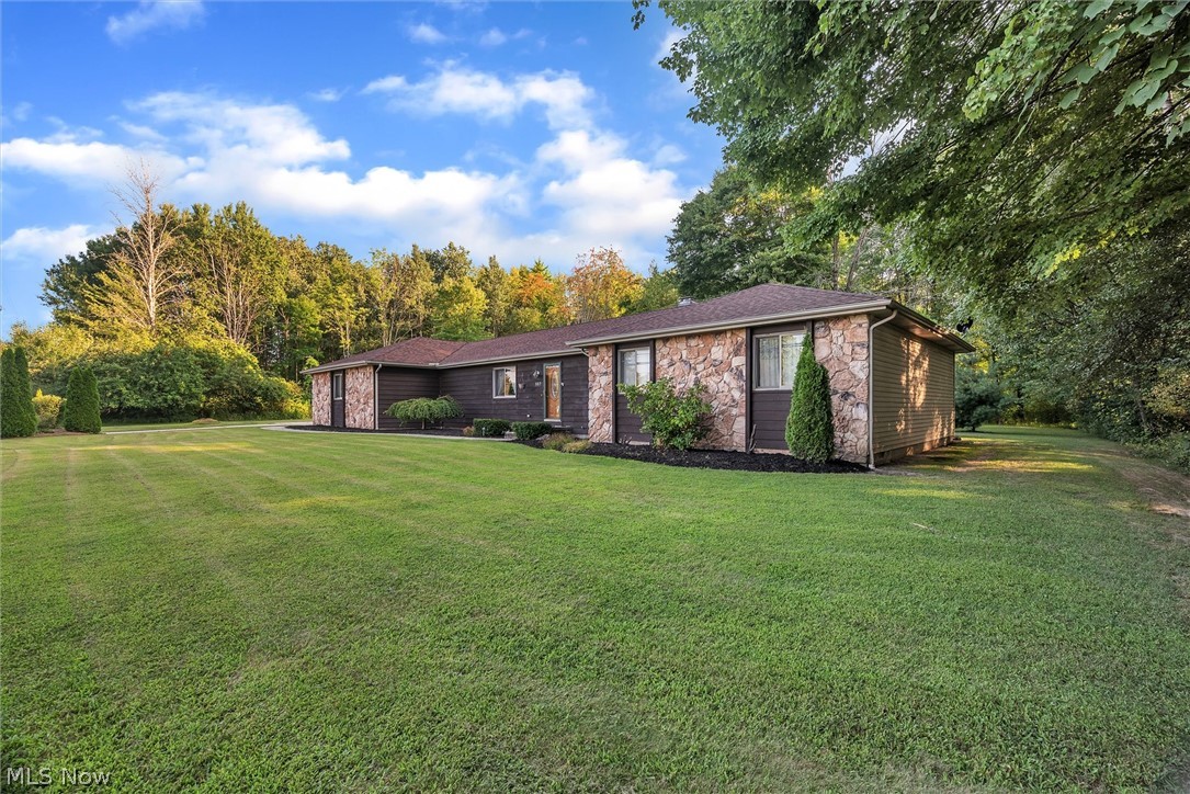 557 Rome Rock Creek Road Roaming Shores, OH 44084 - Photo 3 of 34 Gallery Image 3