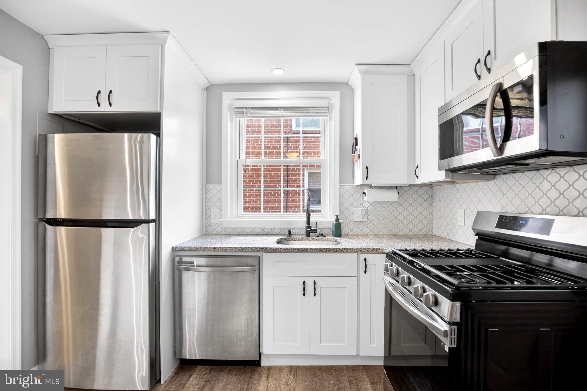 712 Clarendon Road Drexel Hill, PA 19026 - Photo 12 of 30 Modern kitchen with sleek finishes.