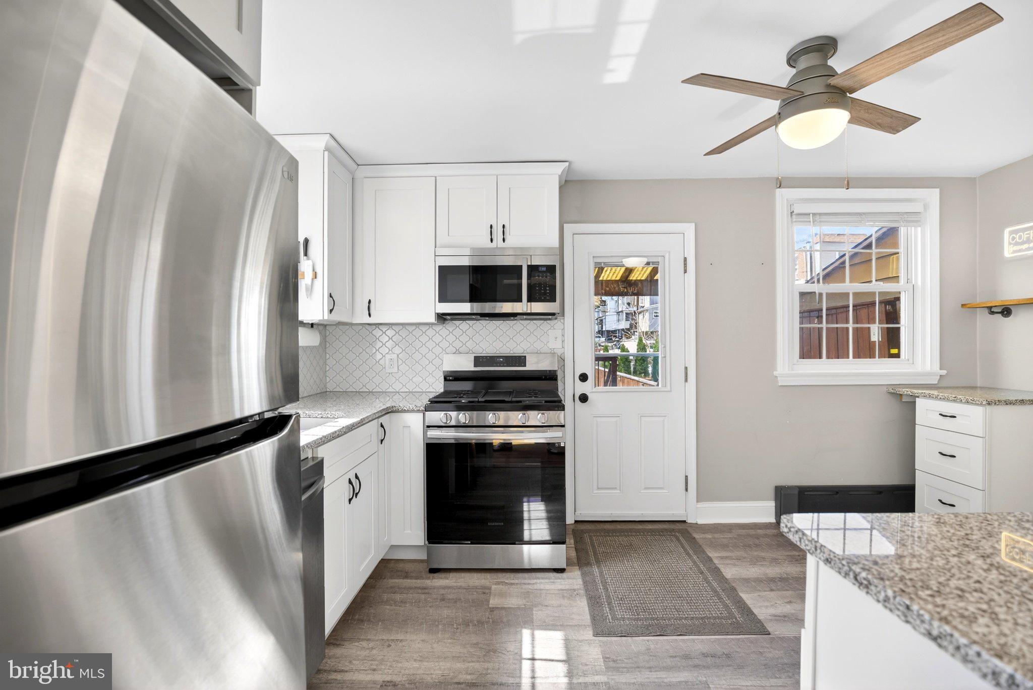 712 Clarendon Road Drexel Hill, PA 19026 - Photo 9 of 30 Modern kitchen with sleek finishes.