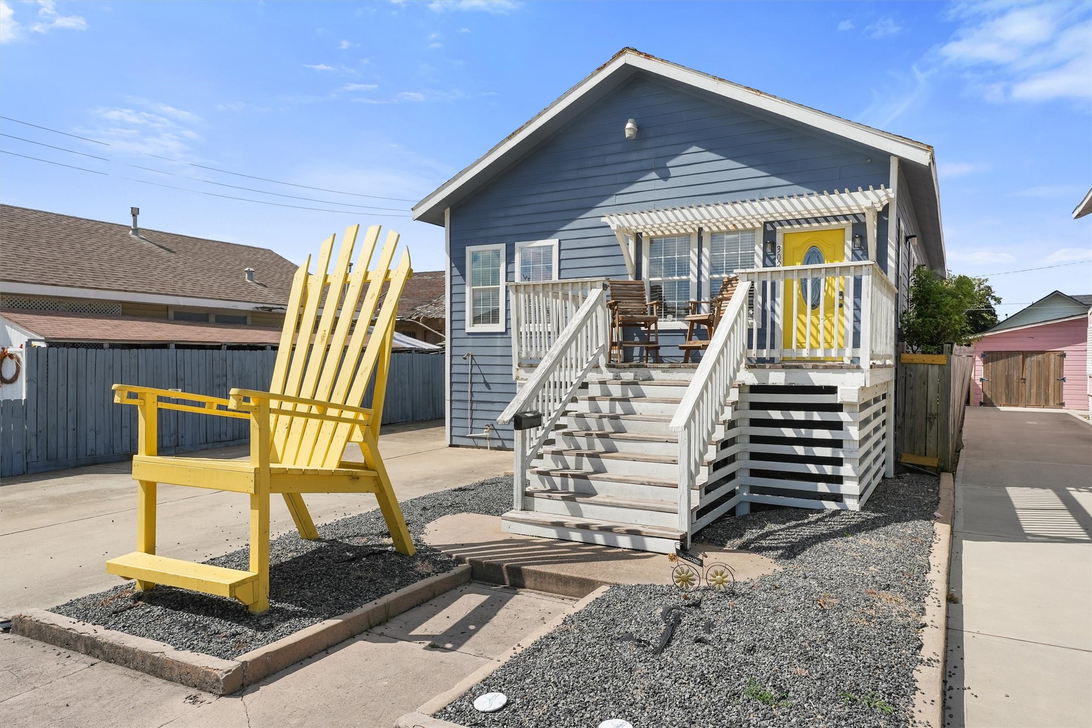 a front view of a house with stairs