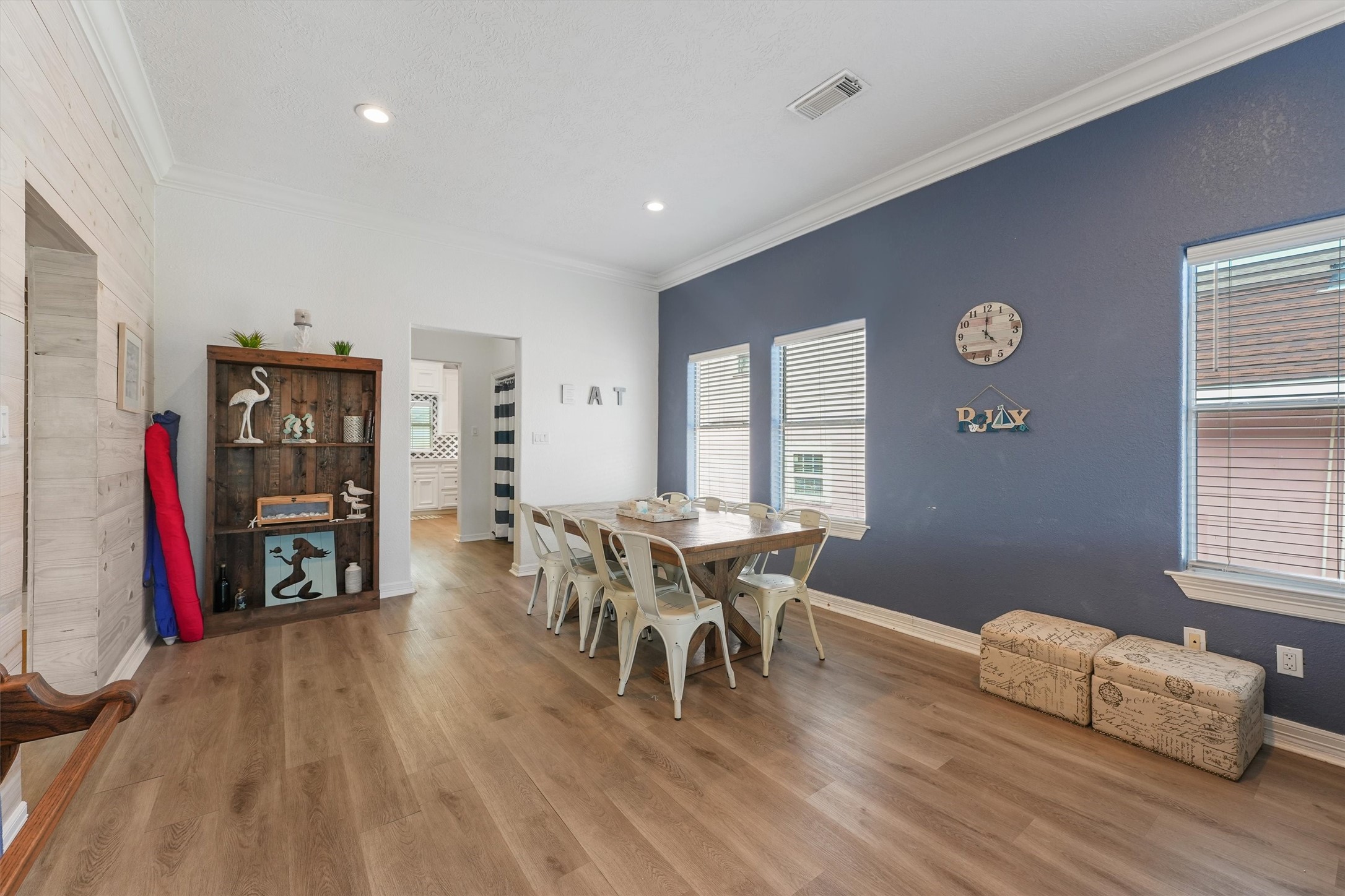 3024 Avenue R 1/2 Galveston, TX 77550 - Photo 11 of 28 a dining room with furniture and wooden floor