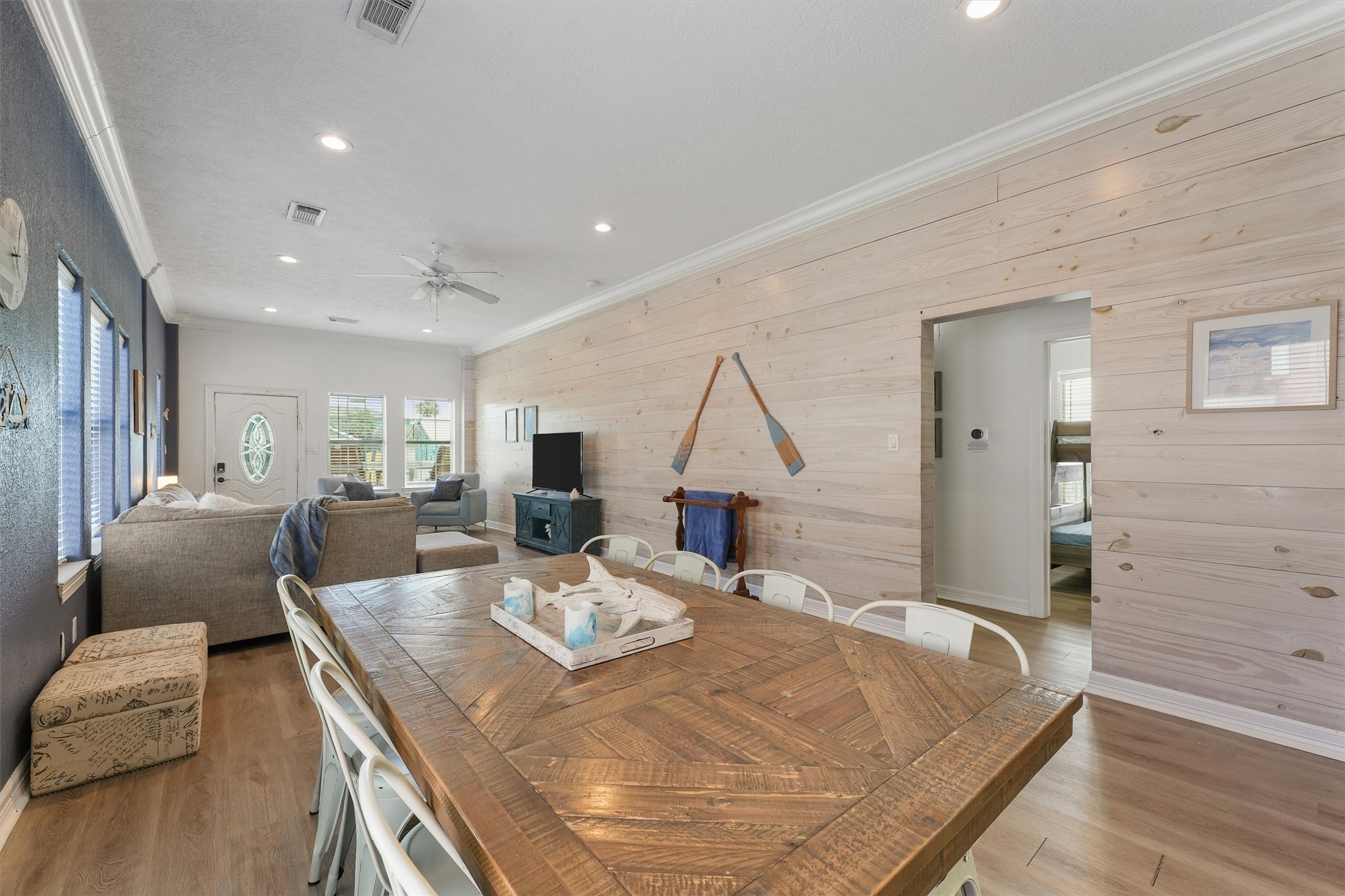 3024 Avenue R 1/2 Galveston, TX 77550 - Photo 13 of 28 a living room with furniture and a wooden floor