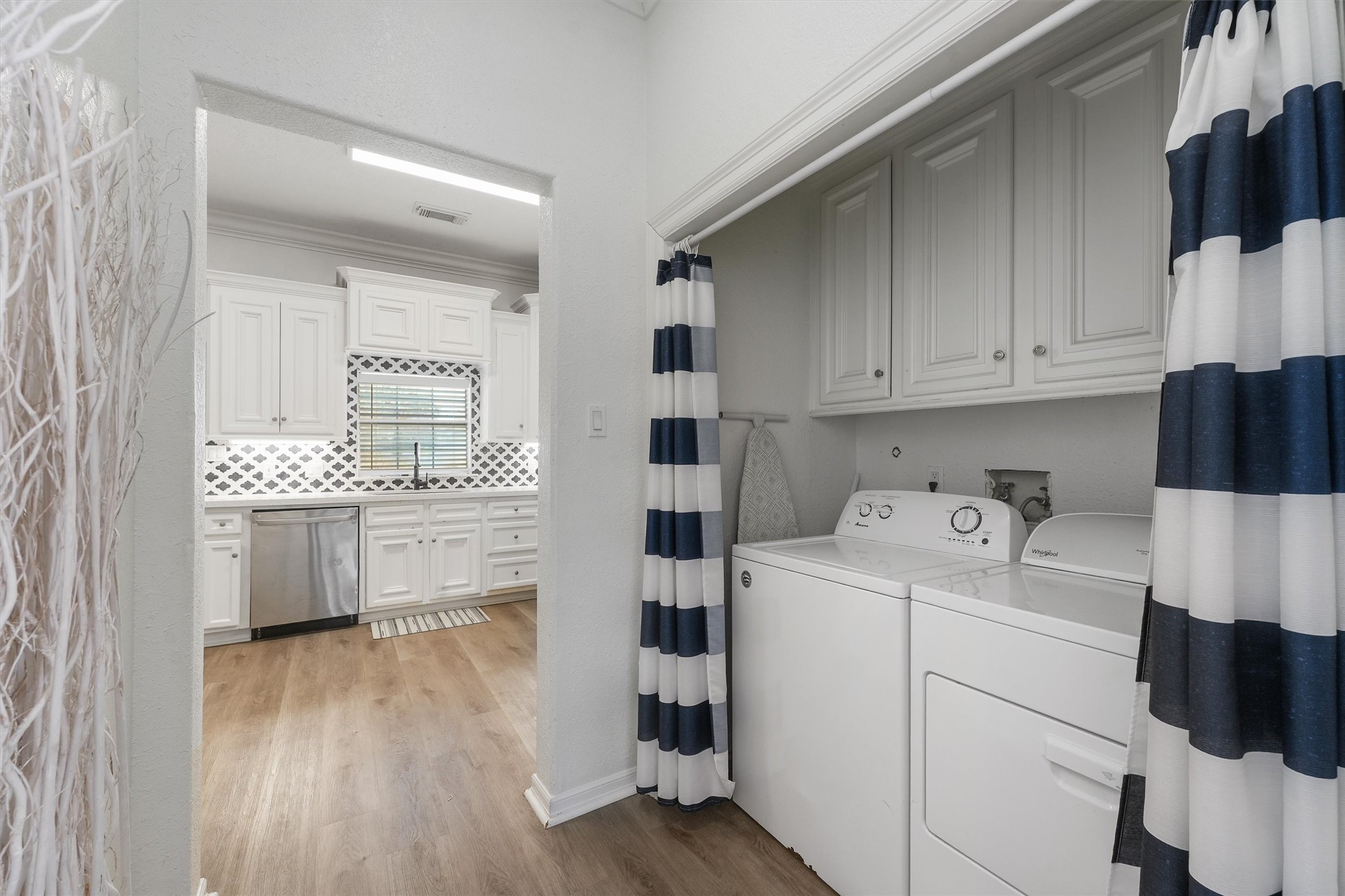 3024 Avenue R 1/2 Galveston, TX 77550 - Photo 14 of 28 a view of kitchen and wooden floor
