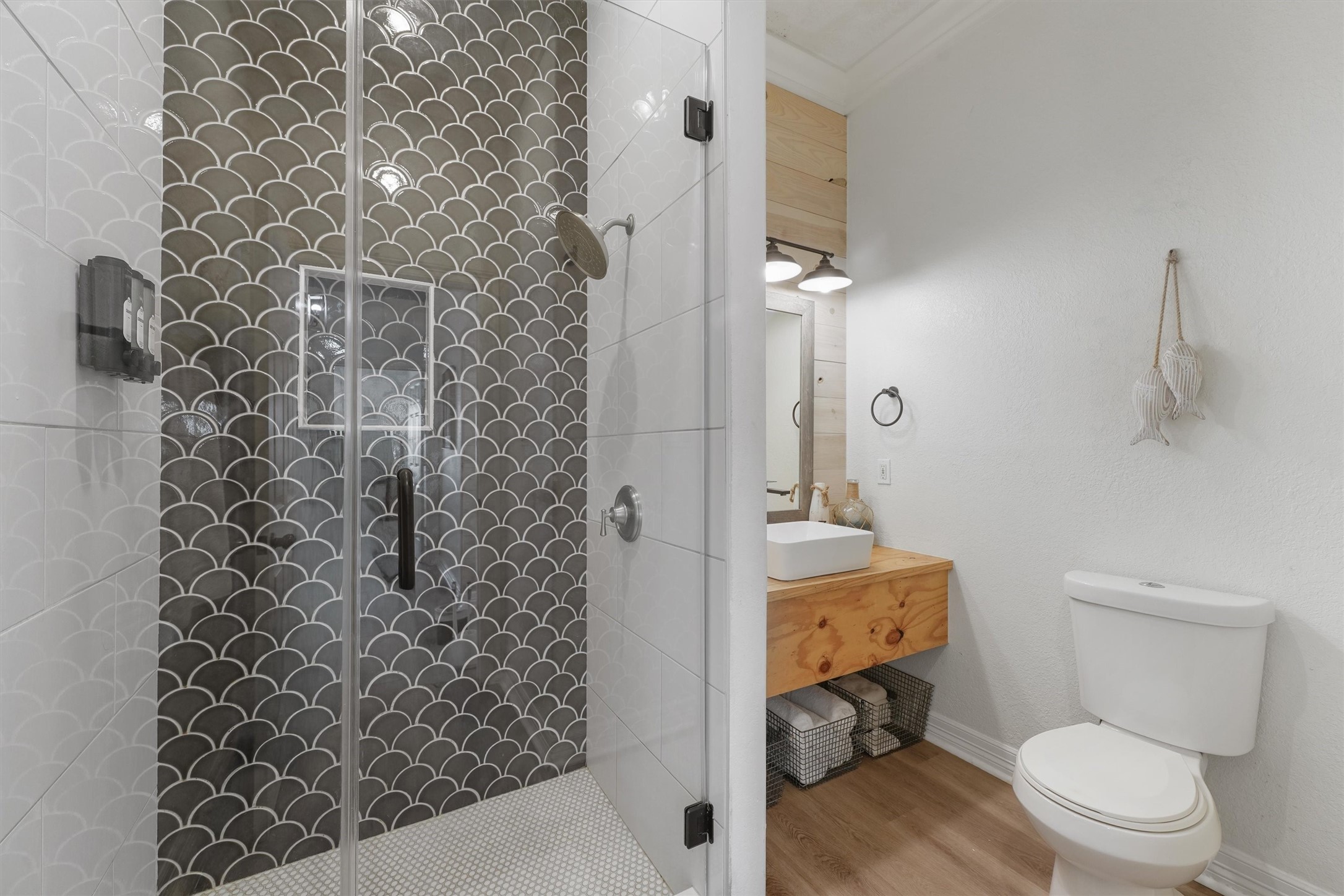 3024 Avenue R 1/2 Galveston, TX 77550 - Photo 17 of 28 a bathroom with a toilet and a shower