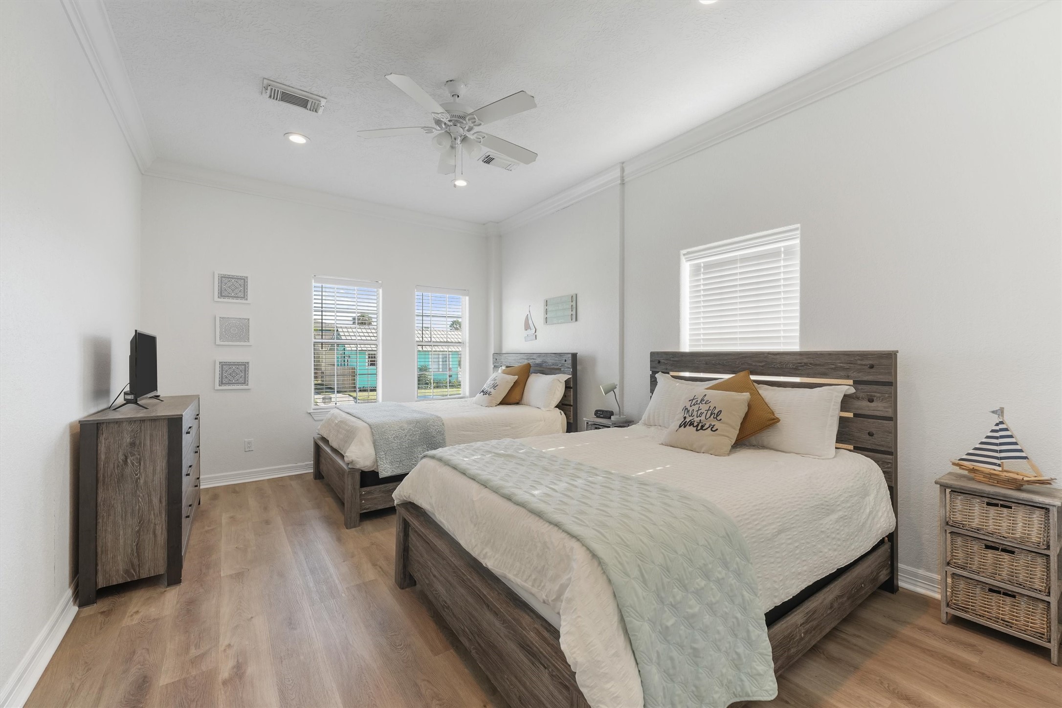 3024 Avenue R 1/2 Galveston, TX 77550 - Photo 22 of 28 a bedroom with bed and window