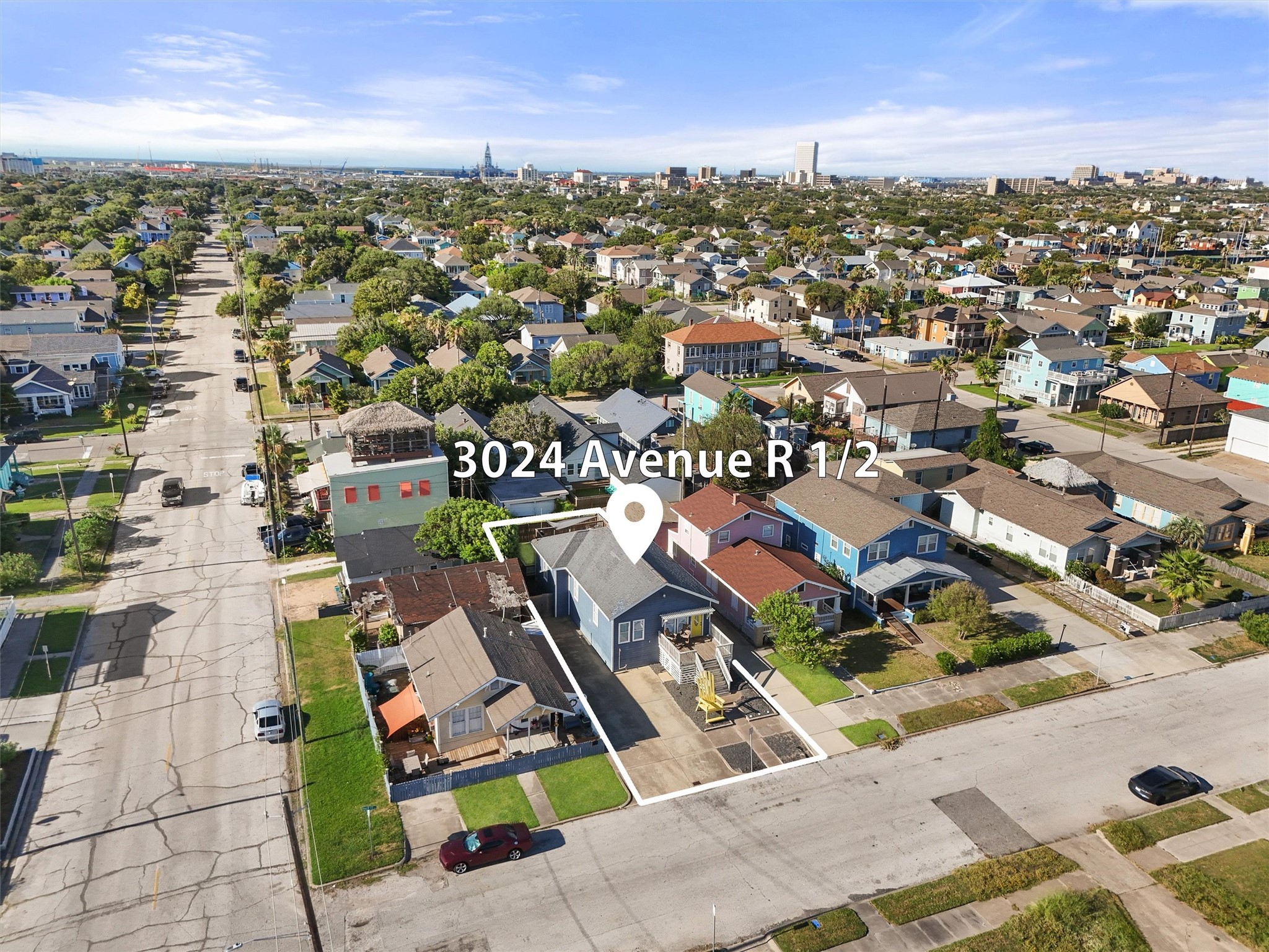 3024 Avenue R 1/2 Galveston, TX 77550 - Photo 25 of 28 an aerial view of a city