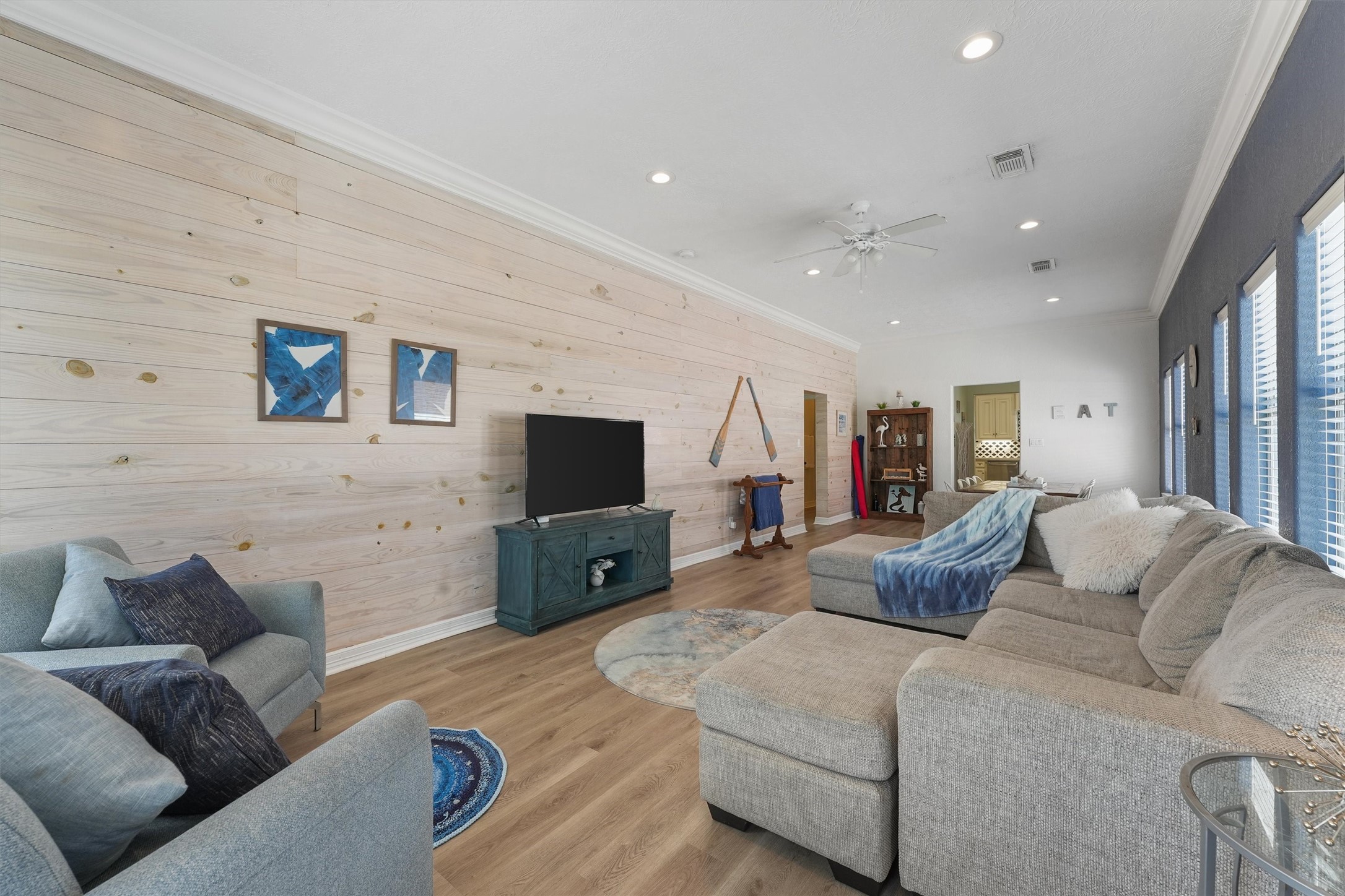 3024 Avenue R 1/2 Galveston, TX 77550 - Photo 3 of 28 a living room with furniture and a flat screen tv