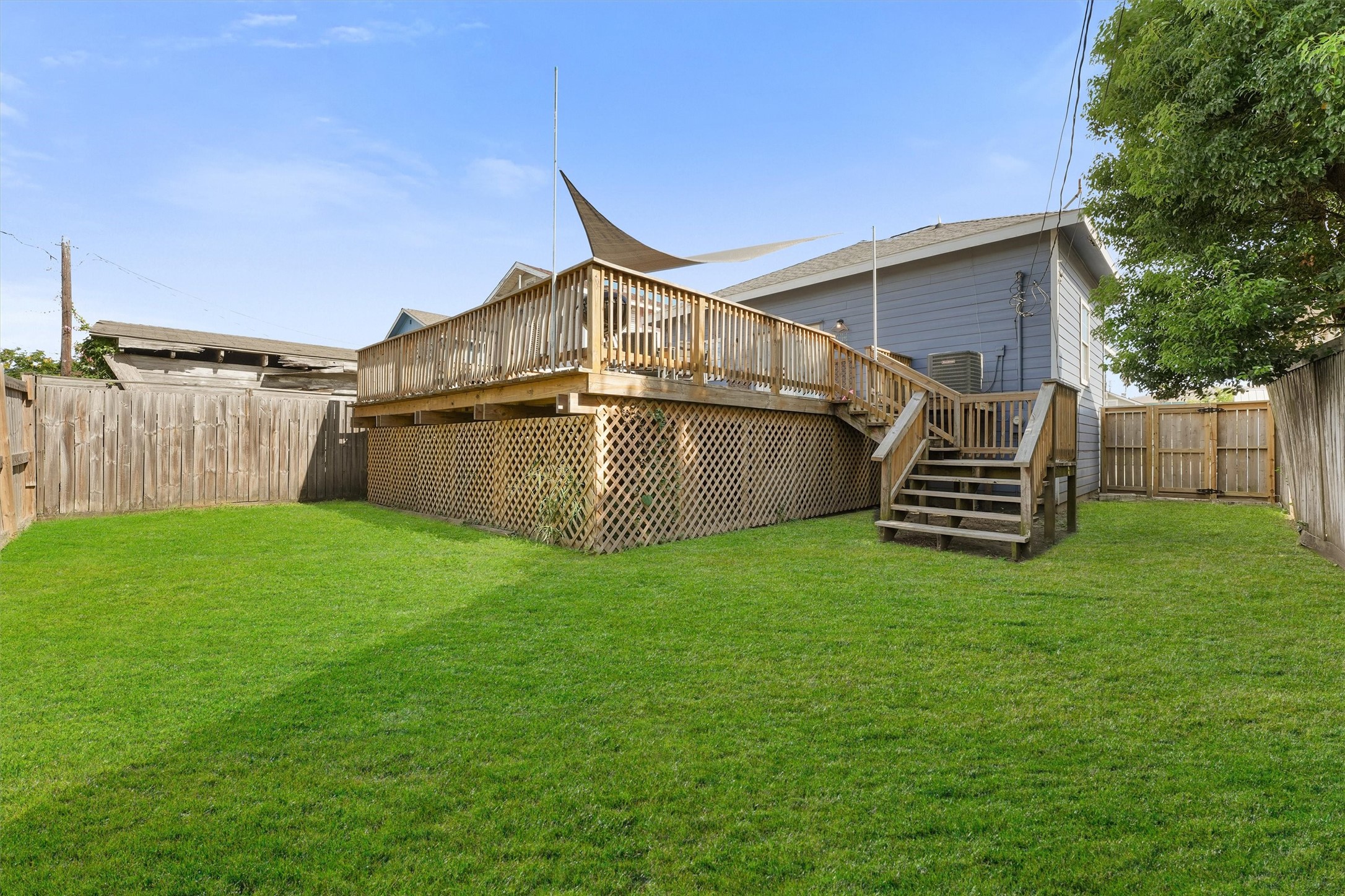 3024 Avenue R 1/2 Galveston, TX 77550 - Photo 6 of 28 a view of a backyard with a garden