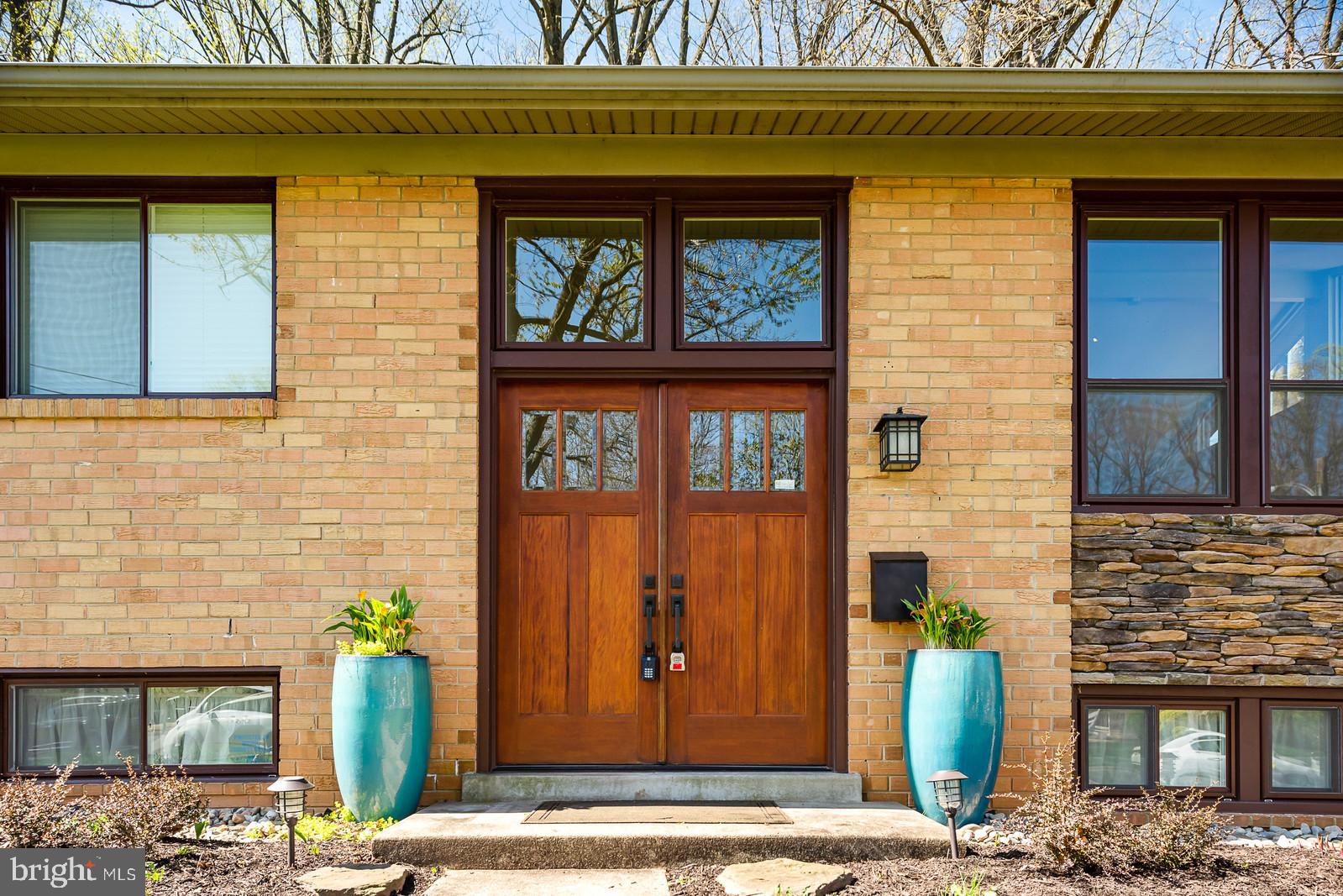 8940 Victoria Road Springfield, VA 22151 - Photo 4 of 29 Updated door and rock wall feature.