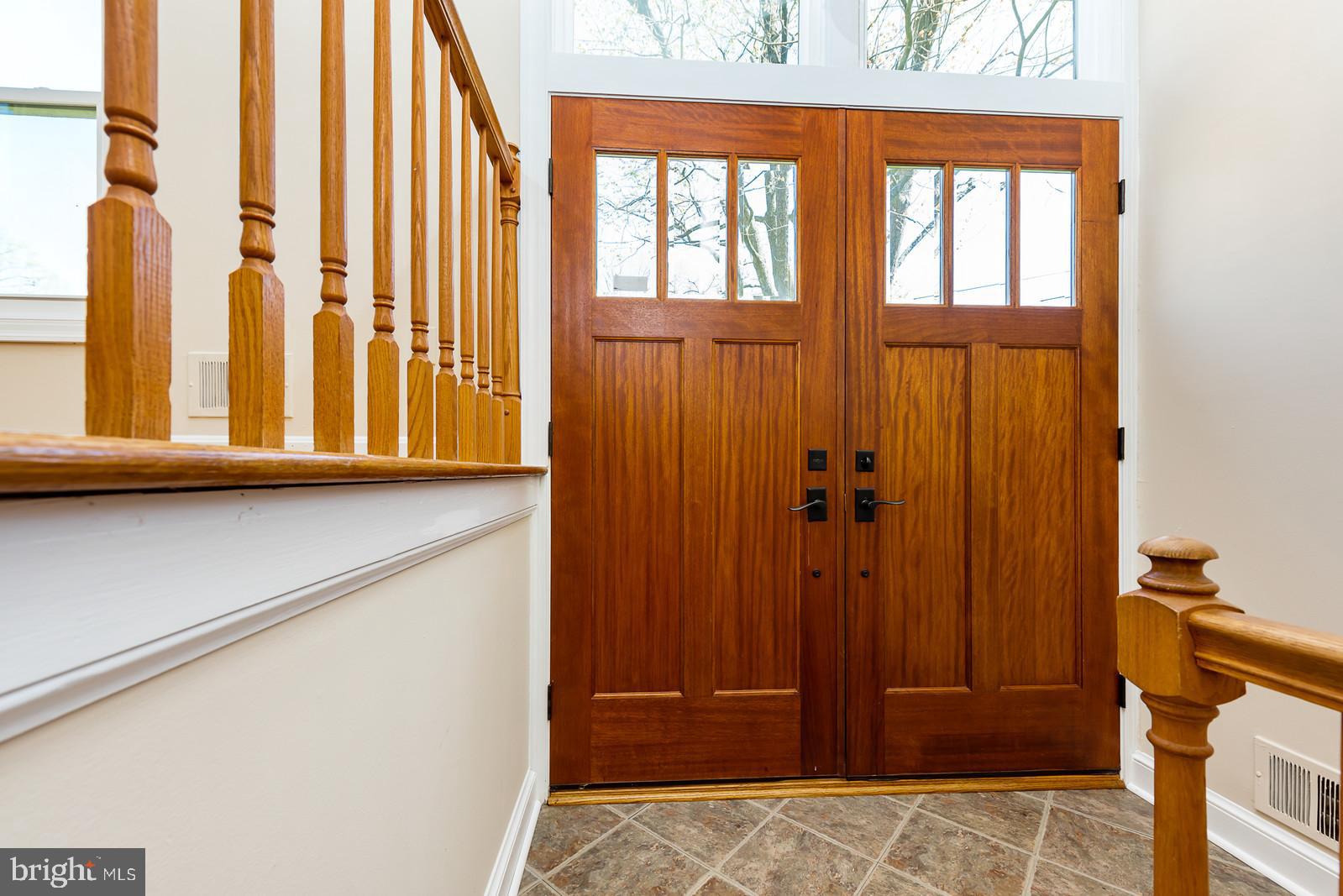 8940 Victoria Road Springfield, VA 22151 - Photo 5 of 29 Split foyer with a sturdy, more modern door.