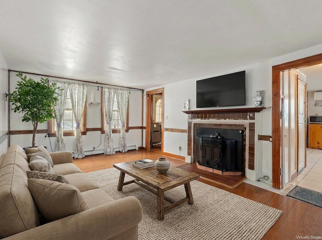 27 Grove Street Springvale, ME 04083 - Photo 15 of 37 virtually_stage_the_living_room_with_a_c