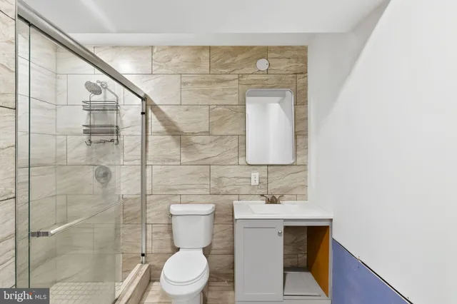 a bathroom with a bathtub and a sink