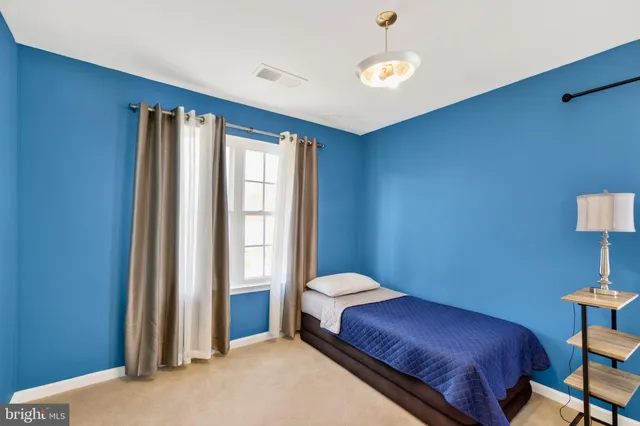 an empty room with closet area