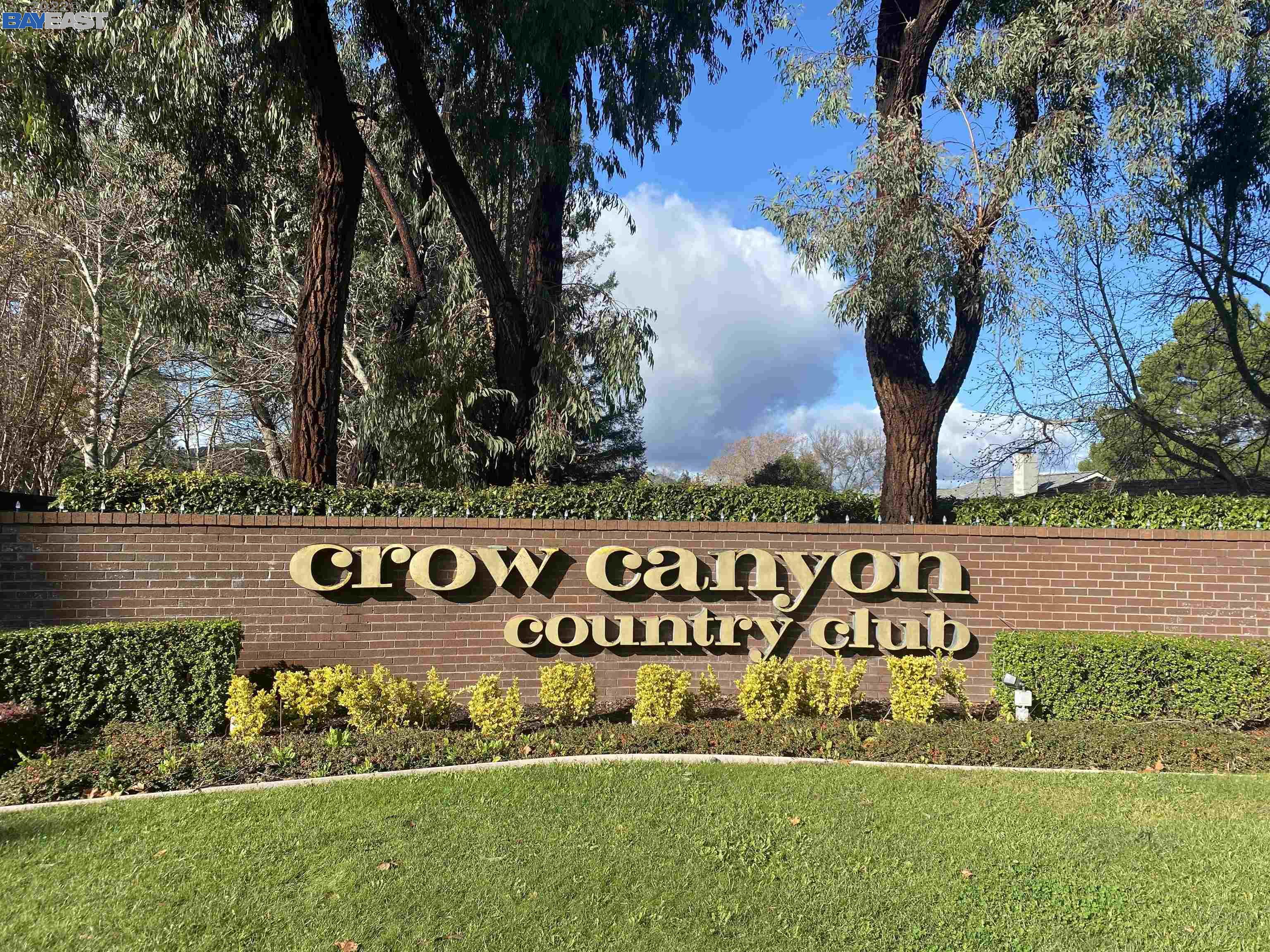 a view of front of a house with a garden