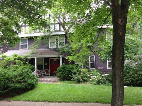 36 Sumner Road Brookline, MA 02445 - Photo 1 of 2 a front view of a house with a yard