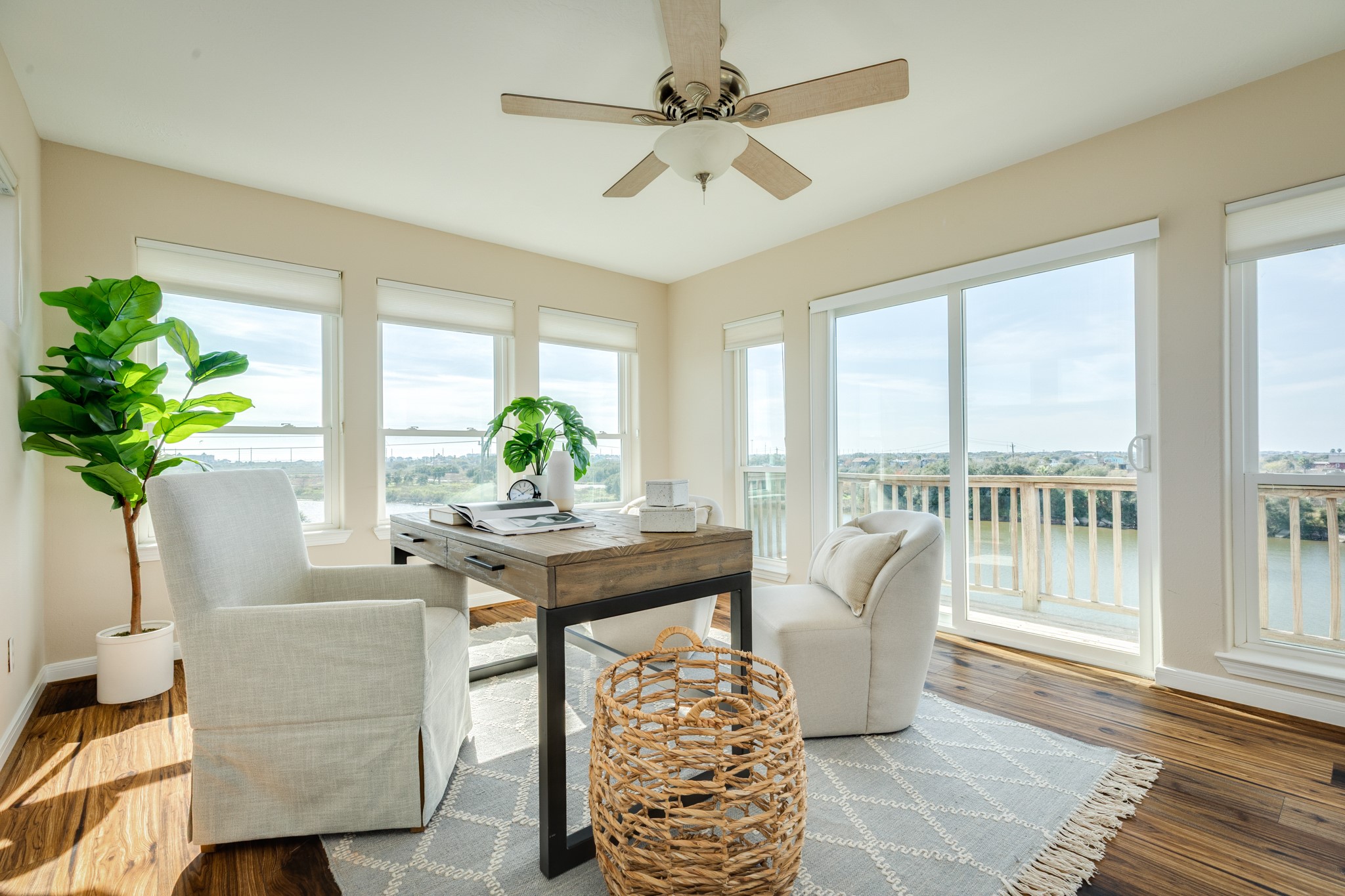 11648 Zingelmann Road Galveston, TX 77554 - Photo 31 of 39 a living room with furniture and a potted plant