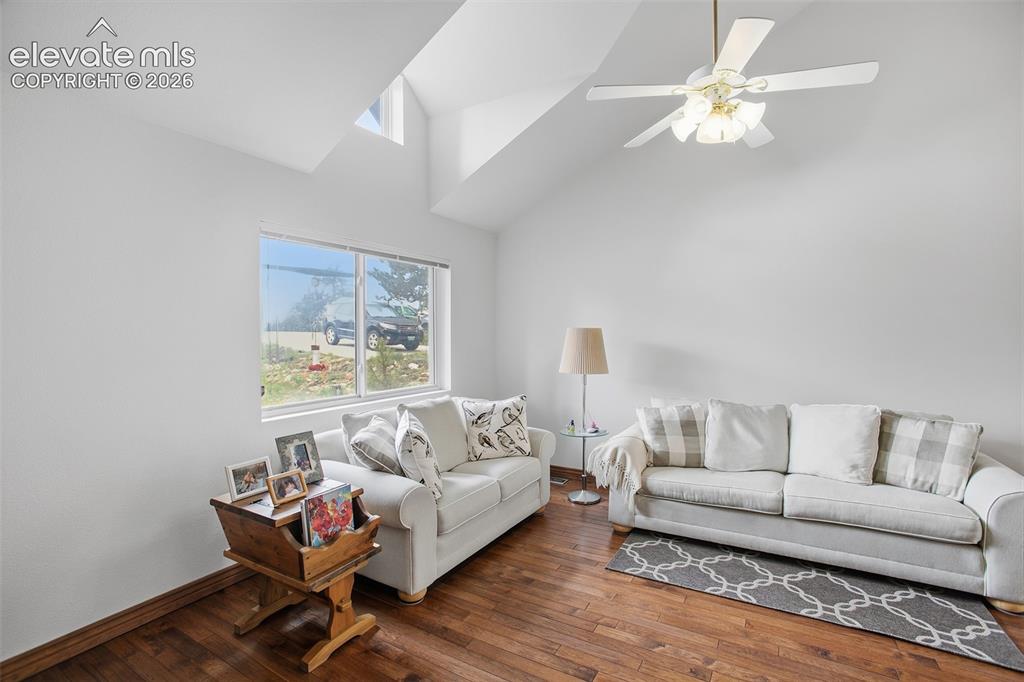 877 North Mountain Estates Road Florissant, CO 80816 - Photo 3 of 23 a living room with furniture and a large window