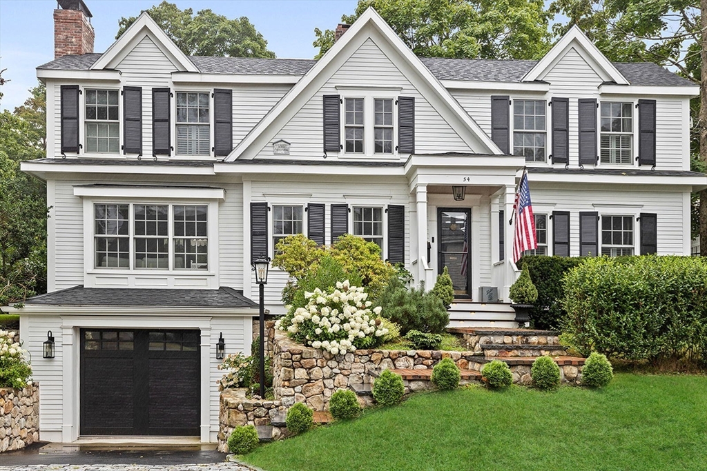 54 Elm Street Hingham, MA 02043 - Photo 1 of 33 a front view of a house with a yard