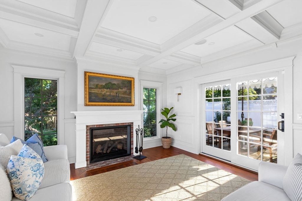 54 Elm Street Hingham, MA 02043 - Photo 11 of 33 a living room with furniture and a fireplace
