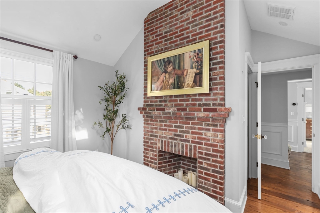 54 Elm Street Hingham, MA 02043 - Photo 18 of 33 a bathroom with a sink and a mirror
