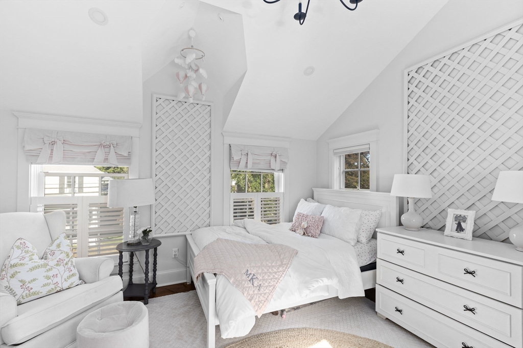 54 Elm Street Hingham, MA 02043 - Photo 23 of 33 a bedroom with a large bed and windows