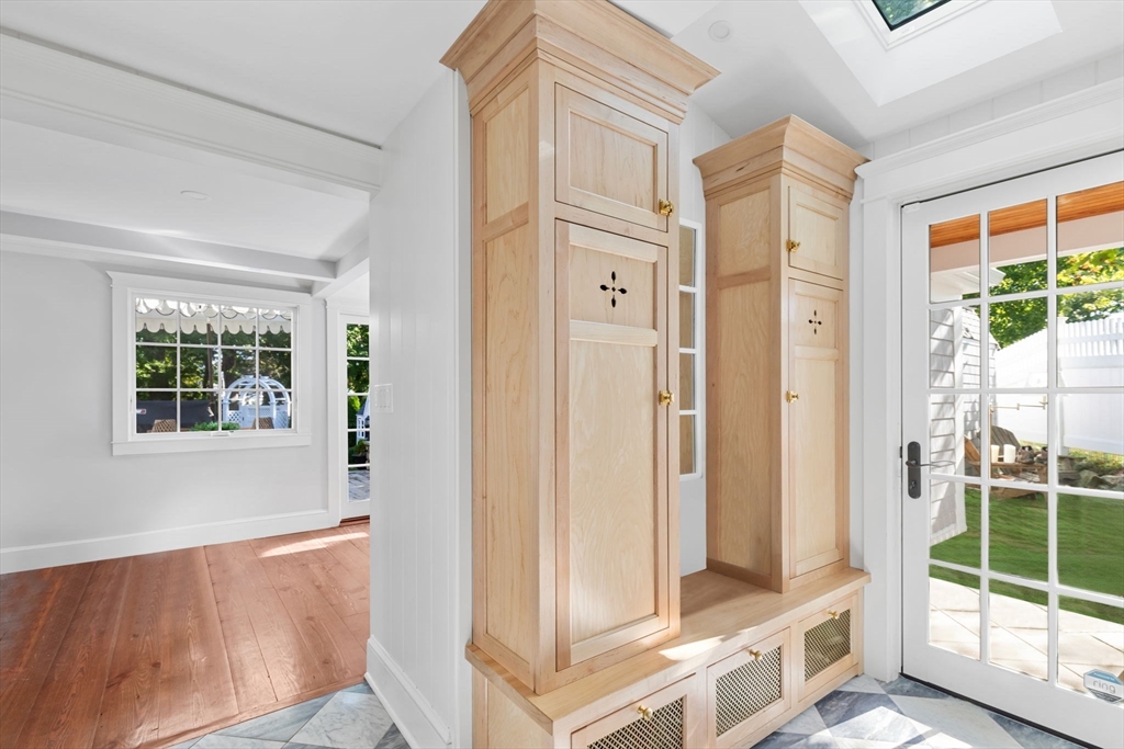 54 Elm Street Hingham, MA 02043 - Photo 26 of 33 a view of a hallway with windows
