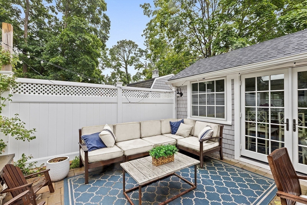 54 Elm Street Hingham, MA 02043 - Photo 27 of 33 a building outdoor space with patio furniture