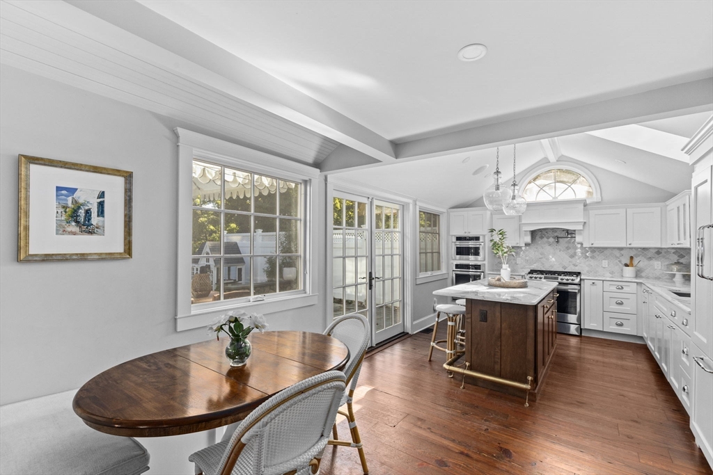 54 Elm Street Hingham, MA 02043 - Photo 5 of 33 a view of a dining room with furniture window and wooden floor