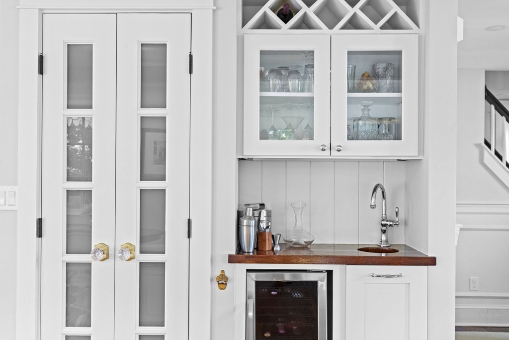 54 Elm Street Hingham, MA 02043 - Photo 7 of 33 a view of a kitchen with stainless steel appliances granite countertop a stove and a window