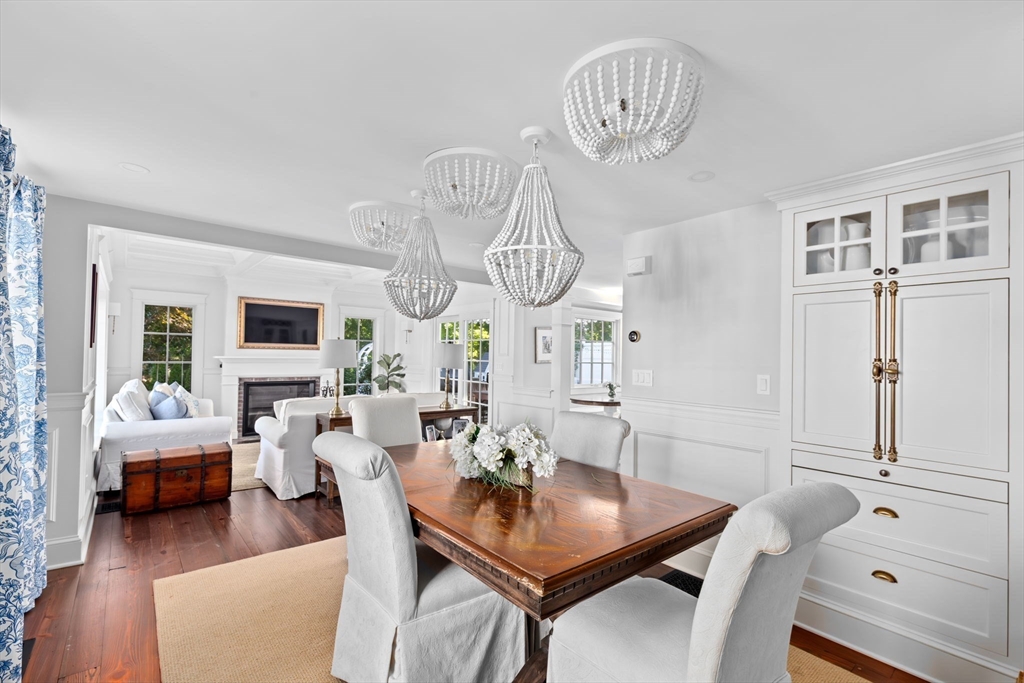 54 Elm Street Hingham, MA 02043 - Photo 8 of 33 a view of a dining room with furniture window and wooden floor
