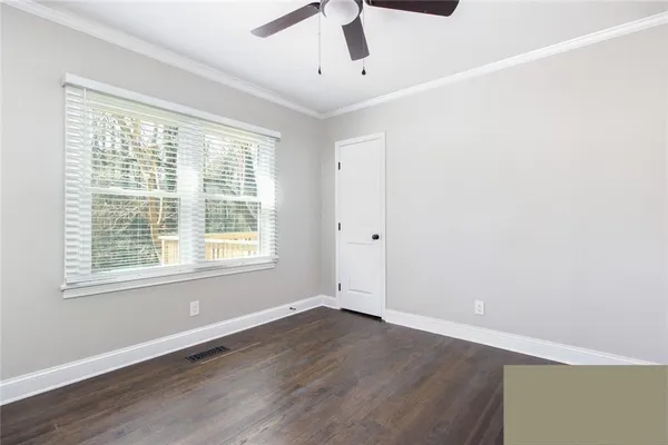 a kitchen with stainless steel appliances granite countertop a refrigerator a sink a stove and cabinets