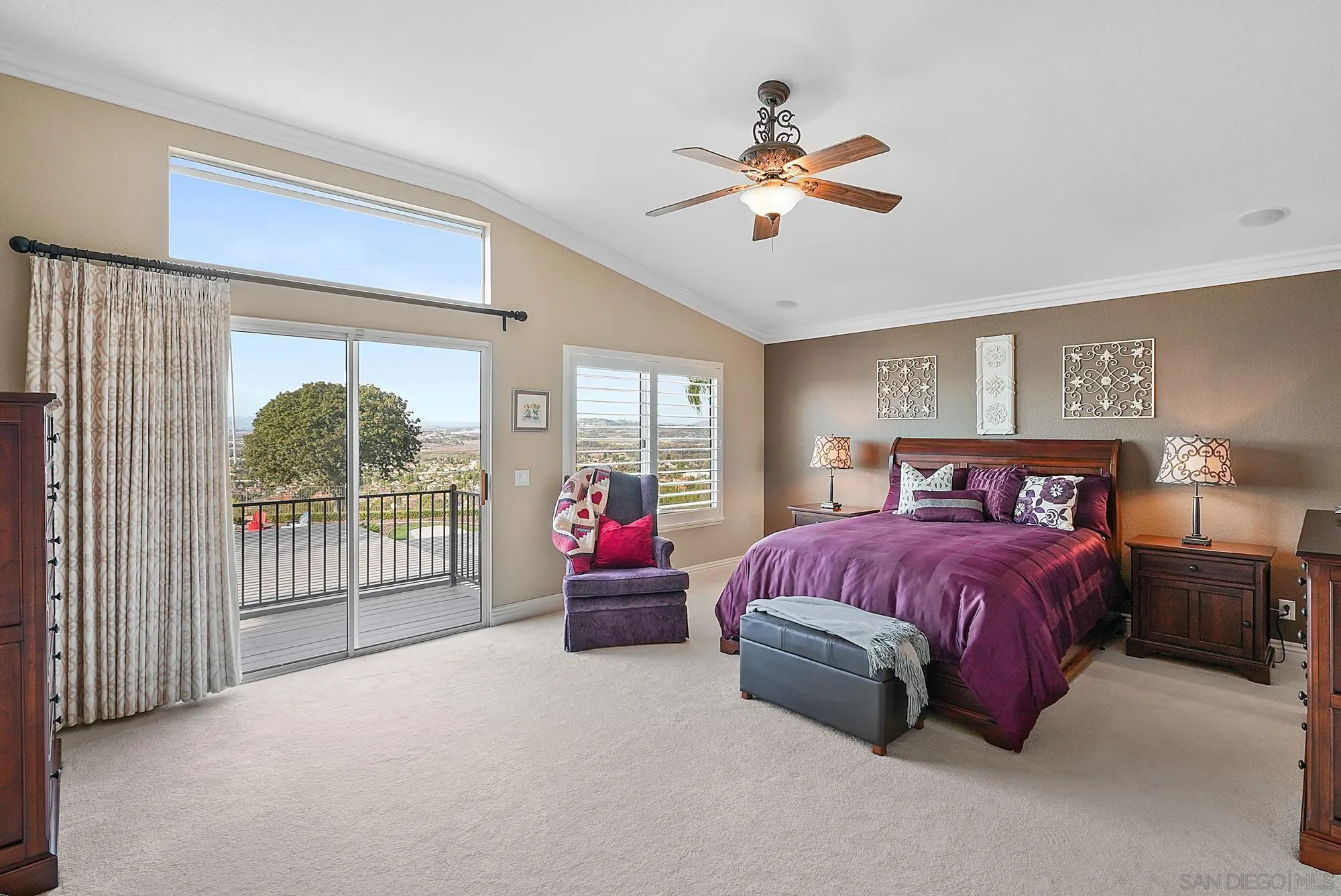 5028 Avenida De La Plata Oceanside, CA 92057 - Photo 26 of 68 a spacious bedroom with a bed and a large window
