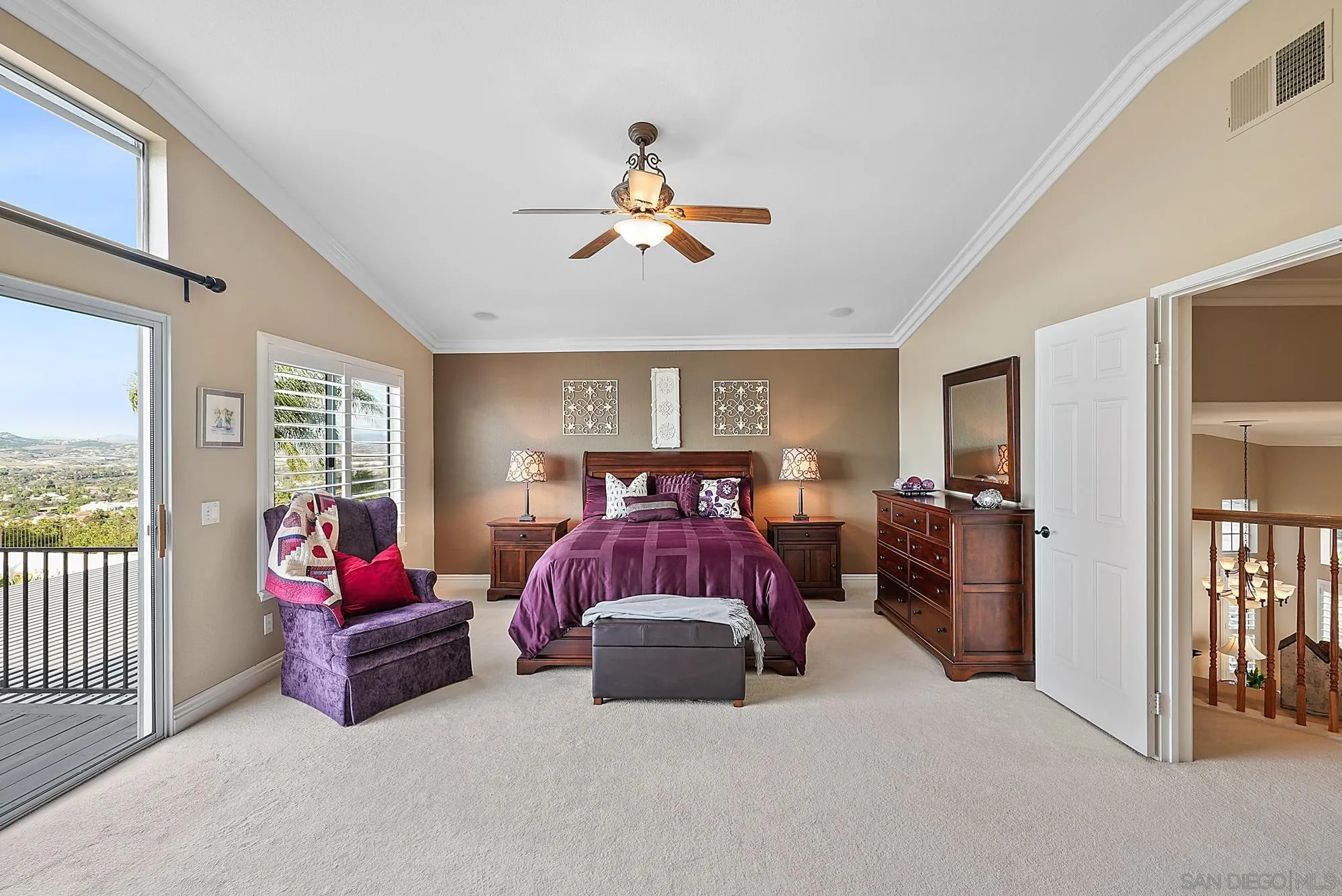 5028 Avenida De La Plata Oceanside, CA 92057 - Photo 27 of 68 a living room with furniture ceiling fan and a rug