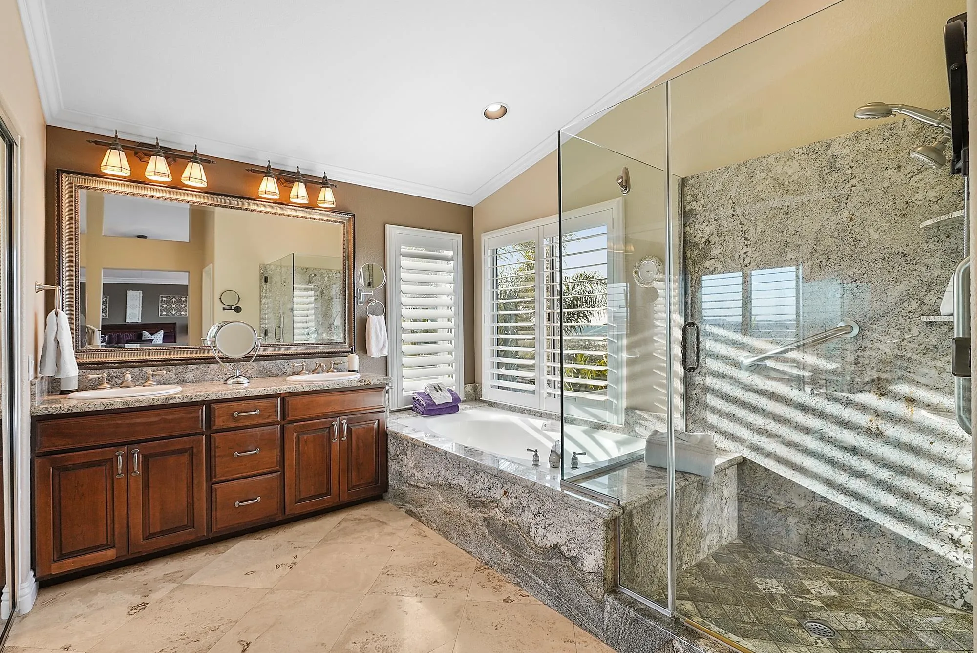 5028 Avenida De La Plata Oceanside, CA 92057 - Photo 30 of 68 a bathroom with a tub sink and mirror
