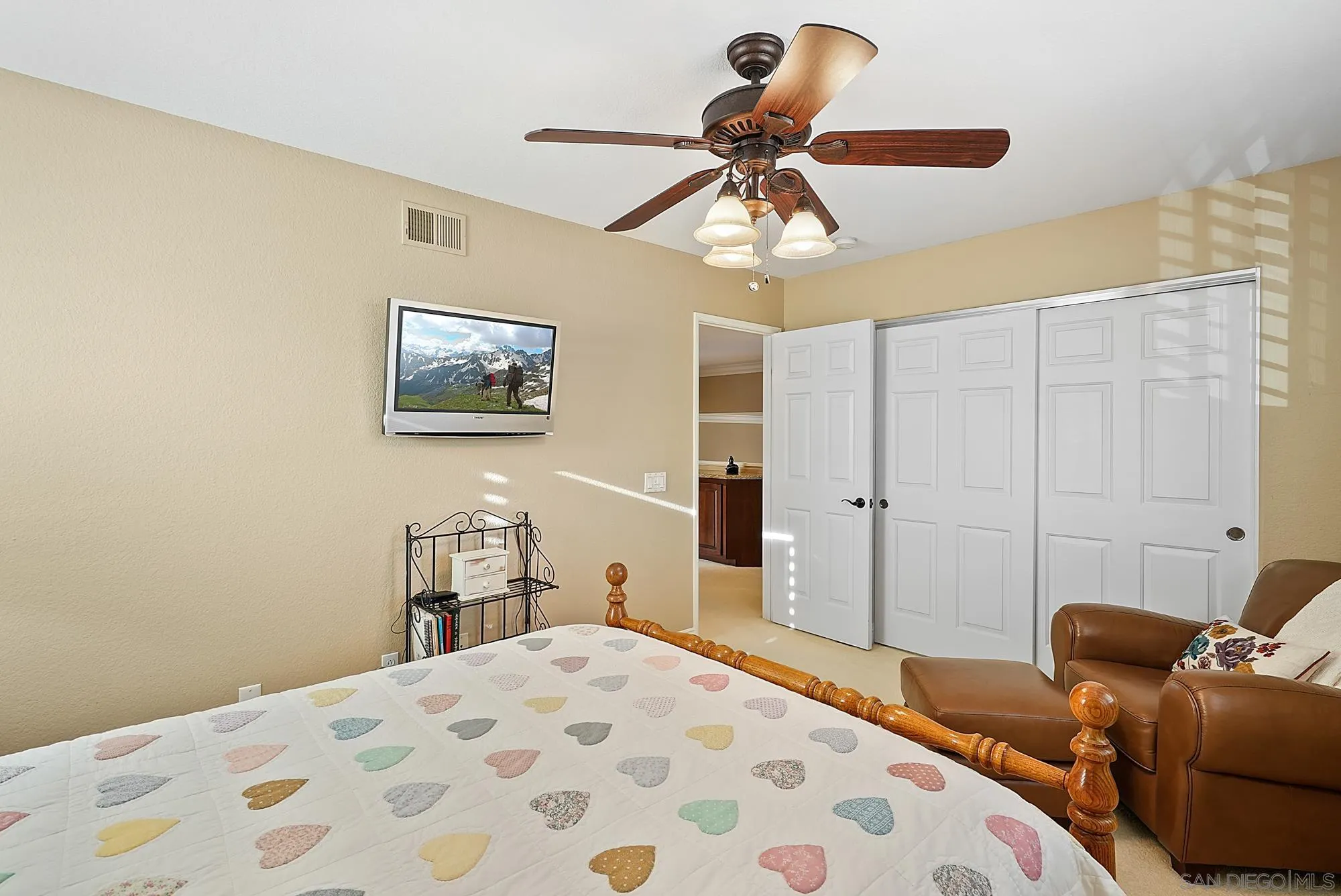 5028 Avenida De La Plata Oceanside, CA 92057 - Photo 36 of 68 a bedroom with a bed and wooden floor