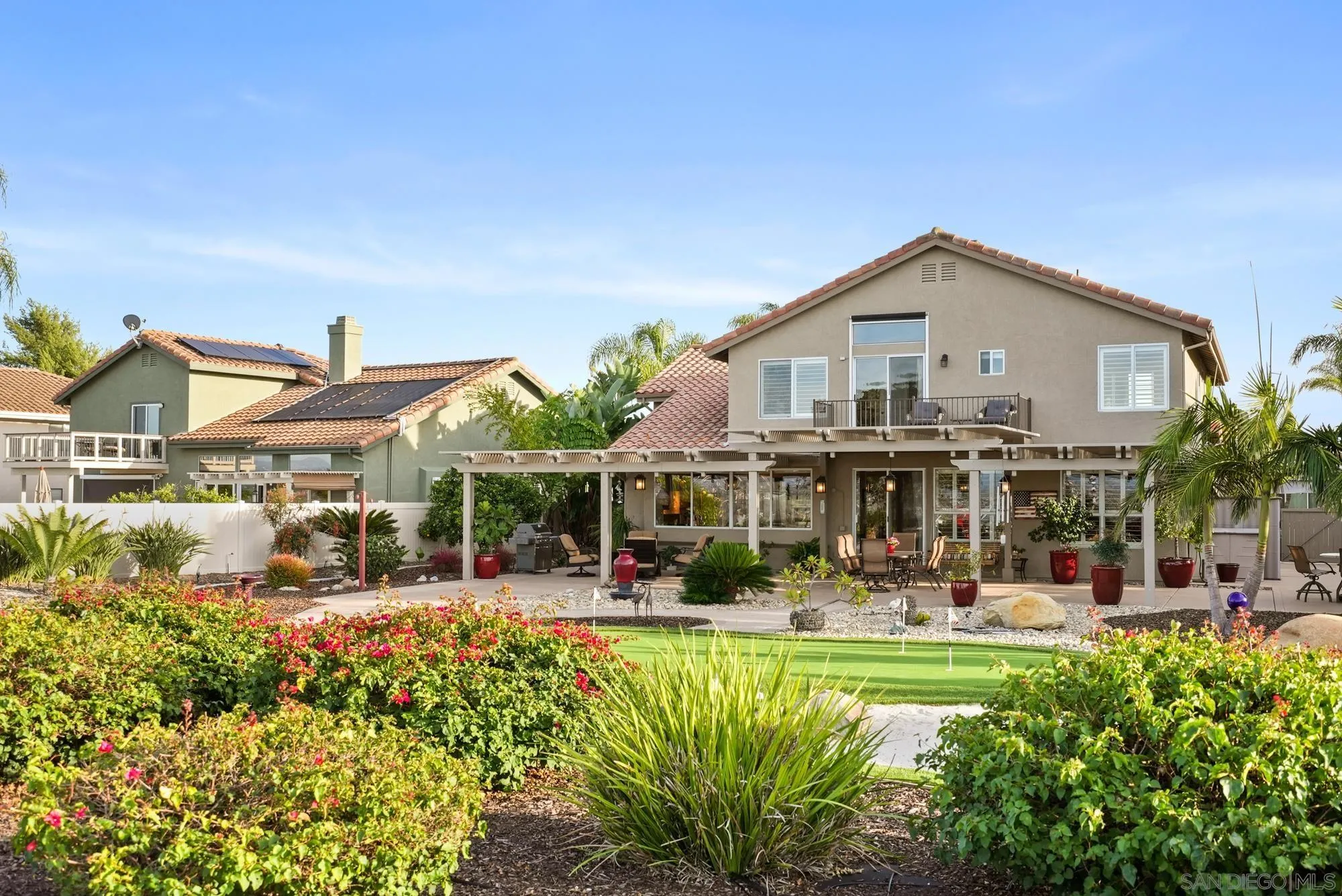 5028 Avenida De La Plata Oceanside, CA 92057 - Photo 52 of 68 front view of a house with a small yard