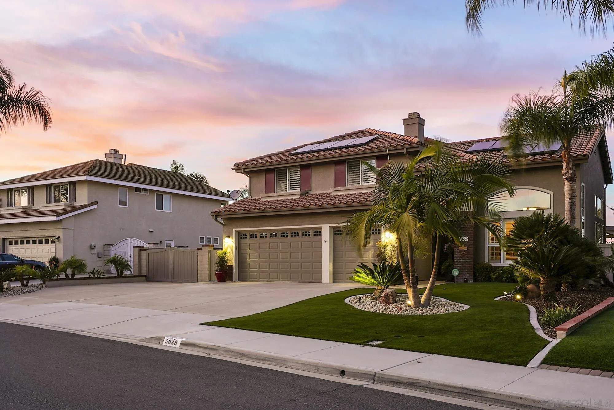 5028 Avenida De La Plata Oceanside, CA 92057 - Photo 53 of 68 a front view of a house with a yard