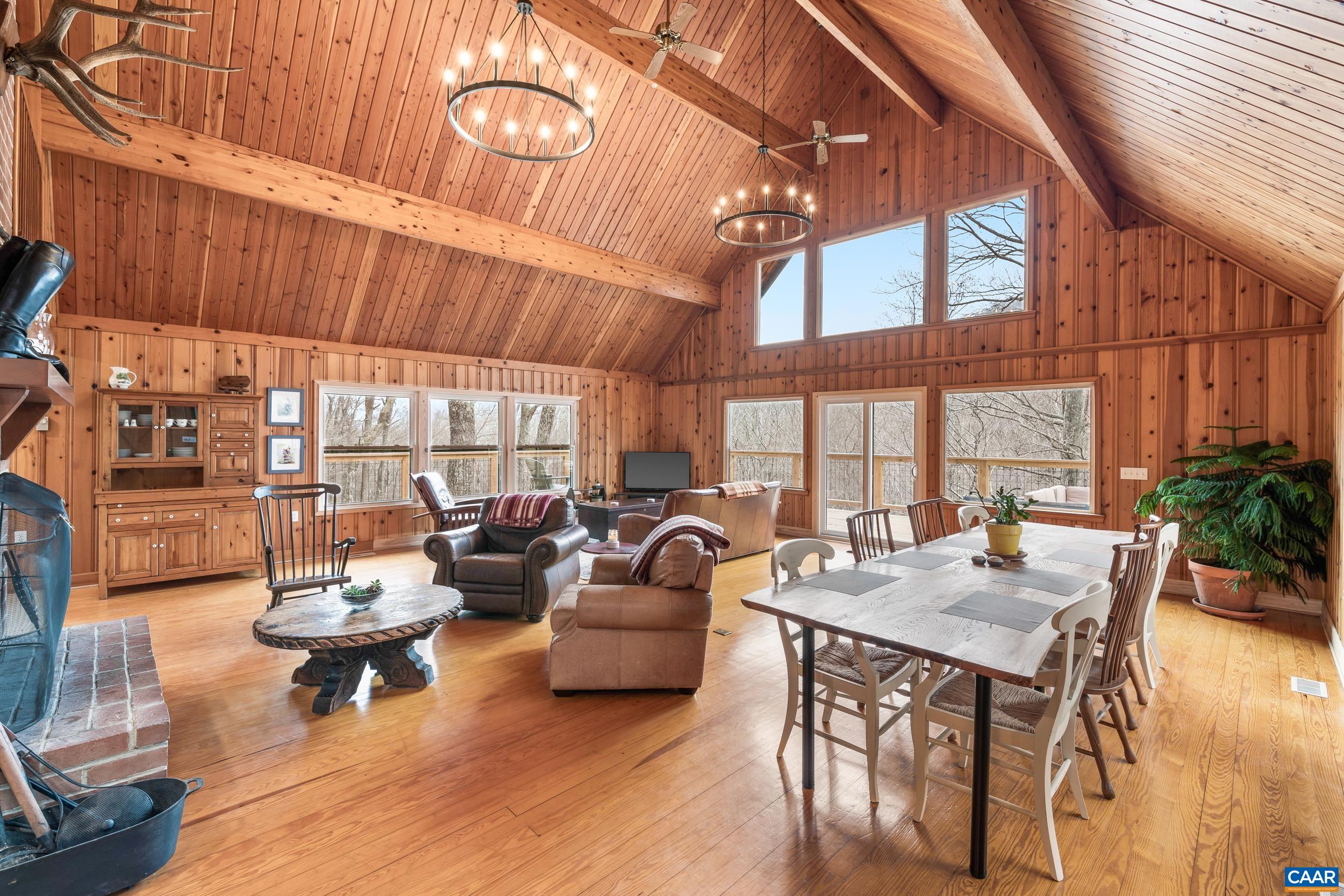 4496 Weakley Hollow Road Syria, VA 22743 - Photo 21 of 37 a living room with furniture and a large window
